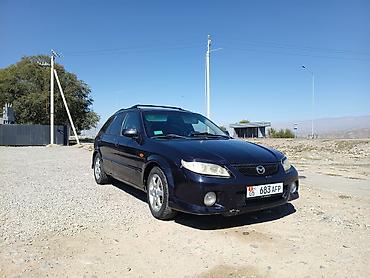 бишкек авто салон: Mazda 323: 2002 г., 2 л, Автомат, Бензин, Хетчбек — 8