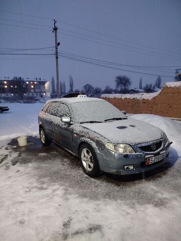 Mazda: Mazda 323: 2003 г., 1.6 л, Механика, Бензин, Хэтчбэк