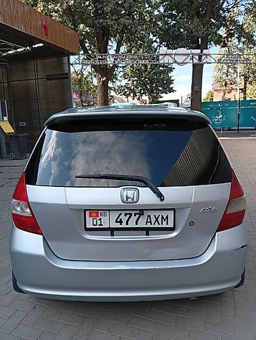byd e6: Honda Fit: 2002 г., 1.3 л, Вариатор, Бензин, Лимузин — 4