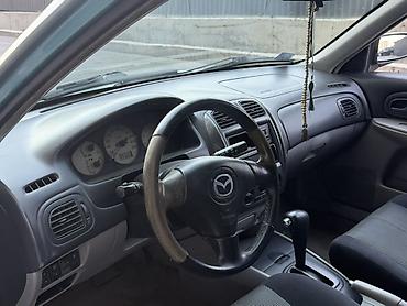 ex 5: Mazda Familia: 2003 г., Автомат, Бензин, Хэтчбэк — 8