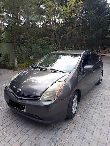ucuz opel: Toyota Prius (2-ci nəsil, liftback) – benzin-elektrik hibrid - Kuzov — 1