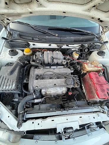 Транспорт: Daewoo Nubira: 1997 г., Бензин, Седан — 10