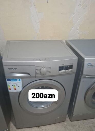 toxuma masini: Sharp paltaryuyan maşın, ön yükləməli, gümüşü rəng. - Elektron