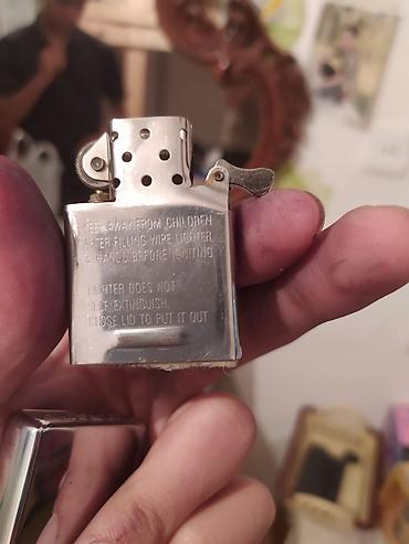 zippo: Məhsul: Oryinal ZIPPO benzinli çaxmaq Şəkildədə göründüyü kimi tam — 1