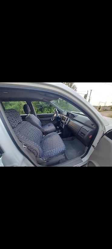 reduktor suretler qutusu: Nissan X-Trail Classic – ağ rəngli, 5 qapılı SUV ili. 2008. 2.5 — 9