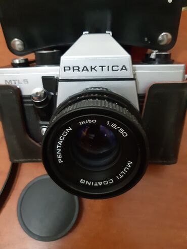 Фотоаппараты: Профессиональный зеркальный пленочный фотоаппарат в состоянии нового и