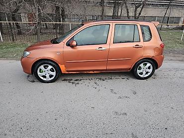 Mazda: Mazda 2: 2003 г., Механика — 10