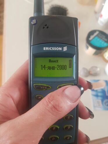 телефон fly fs502 cirrus 1: Ericsson A1018s modeli, mobil rabitə üçün nəzərdə tutulmuş, qara və