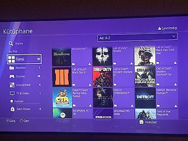 ps4 oyun diskləri: - PlayStation 4 Pro oyun konsolu, üst paneldə xüsusi Joker temalı — 3