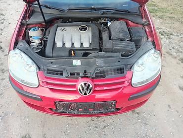 kombi 8 1: Volkswagen Golf V – hečbek, 5 vrata, crvena boja. Motor TDI dizel — 3