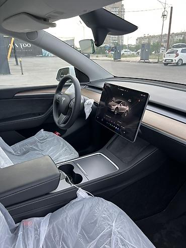 tesla model x: Tesla Model Y: 2024 г., Электромобиль, Кроссовер — 7