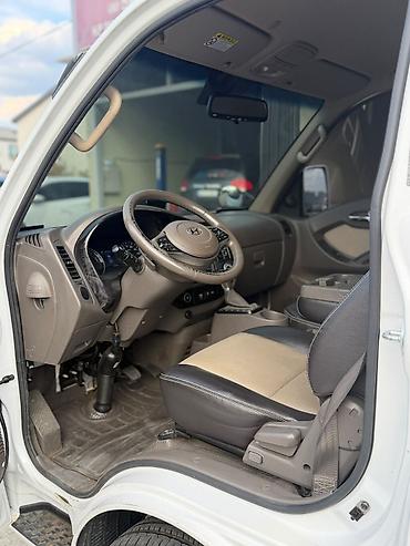 wuling starlight 730: Hyundai Porter (портеровский малотоннажный бортовой грузовик), белый — 3