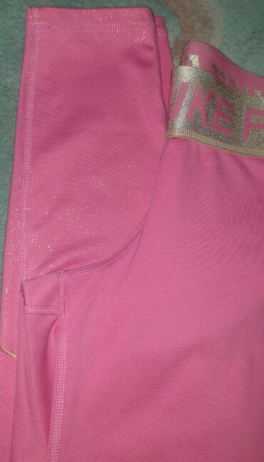 Helanke, biciklistički šortsevi: NIKE pro dri fit original helanke roze boje sa zlatnom debelom gumom — 8