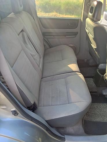 nissan note bufer: Nissan X-Trail (T30) – gümüşü rəngli, benzinlə çalışan kompakt SUV — 7