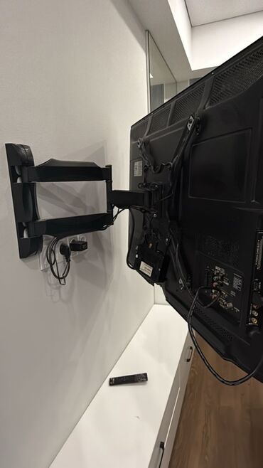 Установка телевизоров: Кронштейн для телевизора поворотно-наклонный от32до65дюймов ( продажа — 5