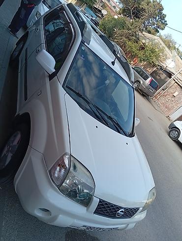 audi a8: Nissan X-Trail, ağ rəng, benzinli SUV. Xüsusiyyətlər: - Korös: 5 — 1
