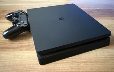 little black dress qiymeti: Qara rəngli PlayStation 4 Slim oyun konsolu. Yeni deyil, ev şəraitində