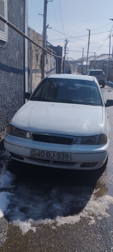 maşın aparatura: Daewoo Nexia: 1.5 л | 2005 г. Седан