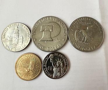 Sikkələr: ABŞ xatirə sikkələri dəsti Tərkib: - 2 ədəd Eisenhower One Dollar — 2
