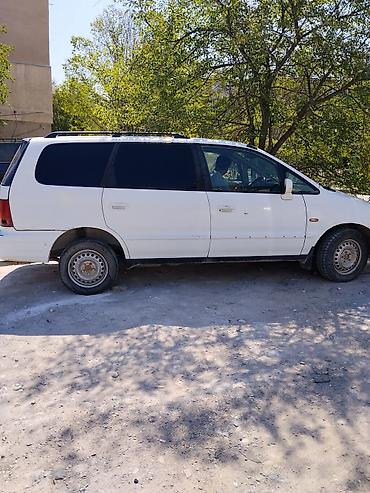 одесей: Honda Odyssey: 1998 г., Минивэн — 6