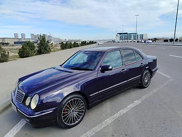 bmw m3 e92: Mercedes-Benz E-Class (W210) sedan Xarici - Tünd bənövşəyi rəngli — 1