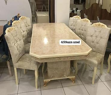 Masalar və oturacaqlar: - Yemək otağı dəsti: 1 masa + 6 stul - Rəng: krem/bej tonları, qızılı — 1
