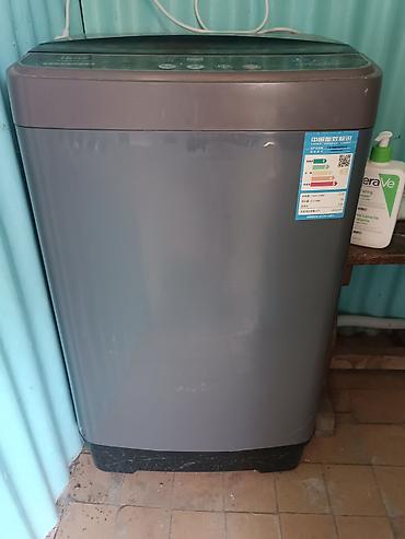 кондер: Автоматическая стиральная машина Haier XQB100-108, вертикальная — 1
