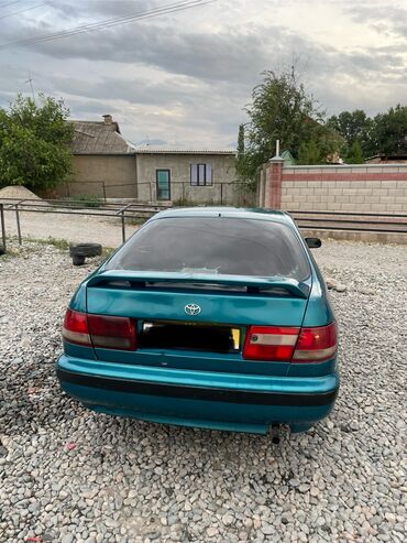 продаю камри 50: Toyota Carina E: 1997 г., 1.6 л, Механика, Бензин, Хэтчбэк