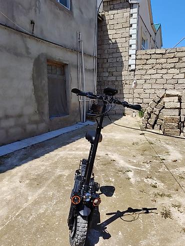 Elektrikli samokatlar: Elektrik skuter – off-road tipli, iri dişli təkərlər və güclü asqı — 3