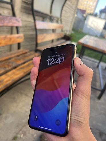 IPhone XS, золотой цвет Характеристики: - Экран 5.8" OLED Super