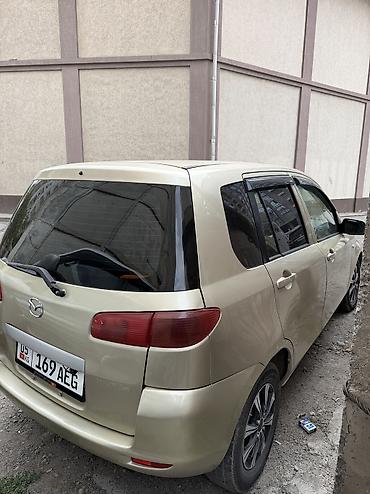 Mazda: Mazda Demio: 2003 г., Автомат — 4