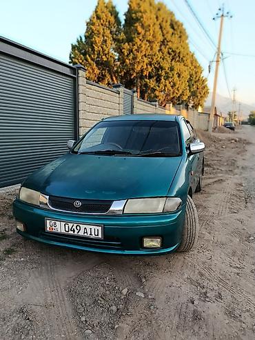 мапет матор: Mazda Familia: 1997 г., 1.6 л, Автомат, Бензин, Седан — 2