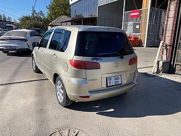 mazda 326: Mazda Demio: 2003 г., 1.3 л, Автомат, Бензин, Хэтчбэк — 2