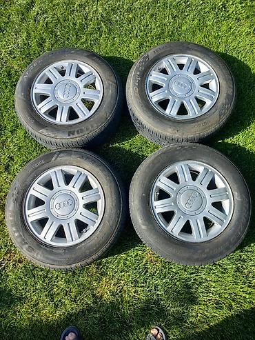 колесо ауди: Комплект из 4 колес Audi: литые диски с фирменными колпаками Audi и — 1
