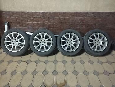385 55: Колеса в сборе 235 / 55 / R 18, Лето, Б/у, Комплект, Легковые, Литые, отверстий - 5 — 1