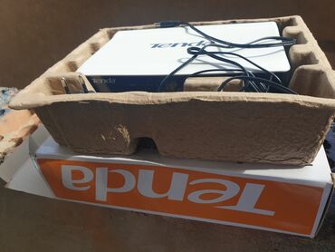 ucuz modem: Tenda 16 Port Desktop Switch Islekdir .Problemi yoxdur .Islenmeyib