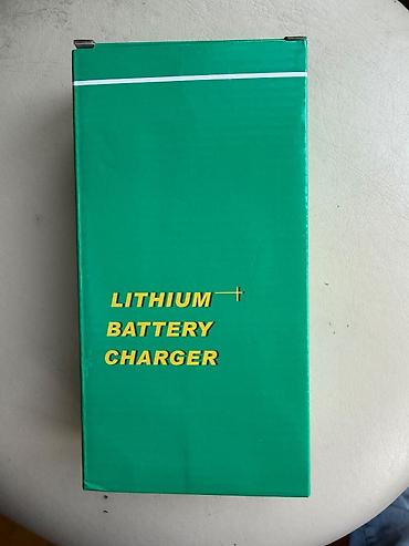 telfolar: Li-ion/Litium Batareya Şarj Cihazı Model: 54.75V 3A (qutuda — 3