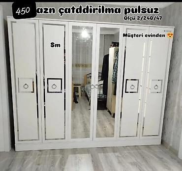 divar ref: Ağ rəngdə, klassik xətlərə malik 6 qapılı garderob. Orta hissədə tam — 1