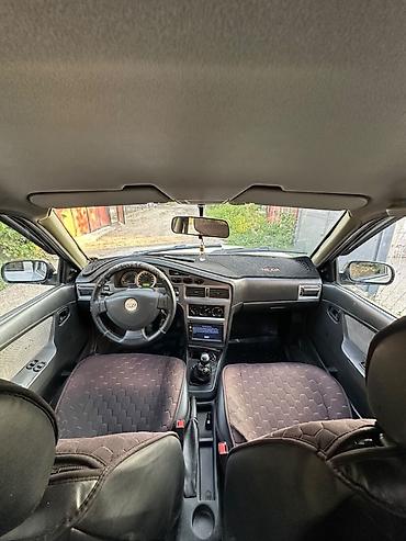 top riding: Daewoo Nexia: 2011 г., 1.5 л, Механика, Бензин, Седан — 6