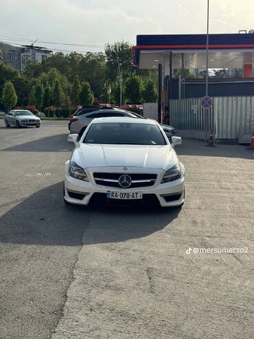 ролс ройс машина: Белый седан Mercedes-Benz CLS-Class с элегантными линиями кузова и