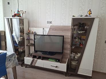 набор инструментов: Qonaq otağı üçün dəst mebel Tərkibi: - TV stendi: mərkəzdə açıq rəfli — 1