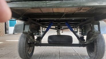 Qoşqular: Yük daşımaq üçün hazırlanmış, tünd yaşıl rəngli ikitəkərli qoşqu — 11