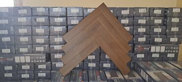 Отделочные материалы: Məhsul: Laminate döşəmə – Krono Plus (balıqqulağı naxışında yığılma