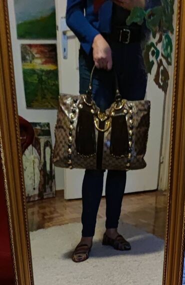 Torbe: Gucci. Fantastična.

Bez ikakvih nedostataka.
45cm x 28cm x 10cm — 6