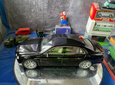 Avtomobil modelləri: Коллекционная модель Bentley Flying Spur W12 Diamond Black 2012 — 23