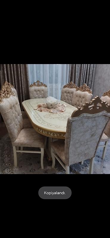 Yenidir Masa desti satılır 550 azn. 8 stul var. Masa açılır unvan