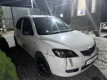 обмен машинами с доплатой: Mazda Demio: 2004 г., 1.3 л, Автомат, Бензин, Хэтчбэк