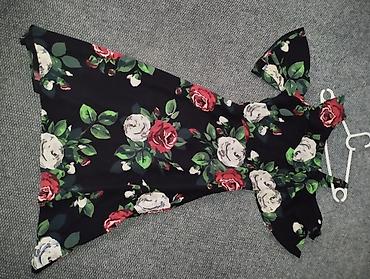 ara torbe: Ženska midi haljina s floralnim printom - Model: kroj u obliku slova — 2
