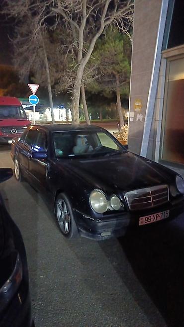 diski mala: Mercedes-Benz E-Class (W210) sedan - Korpus: 4 qapılı sedan, tünd göy — 1