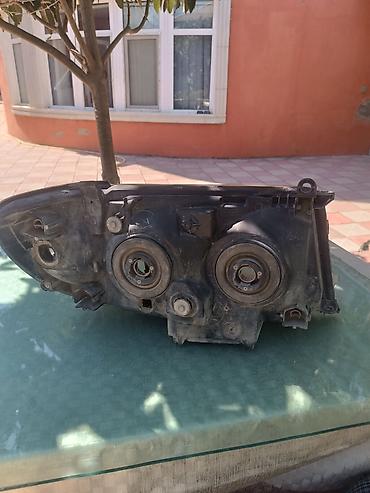 bmw e36 kapot: Toyota Land Cruiser 100 fara ( 2005 ) qabaq ( on ) sag fara original — 4